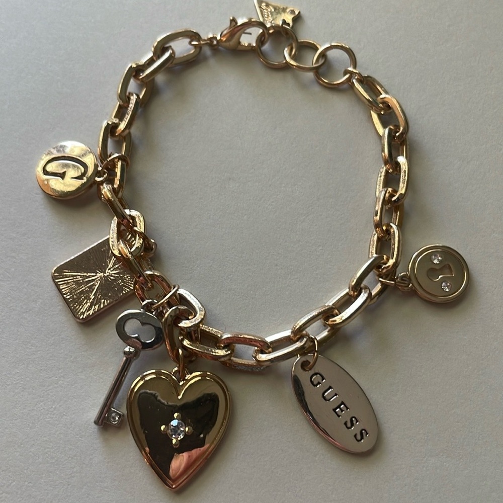 DESIGNER GUESS SILVER CHARM BRACELET